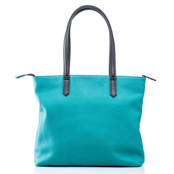 female turquoise leather handbag - 写真・画像