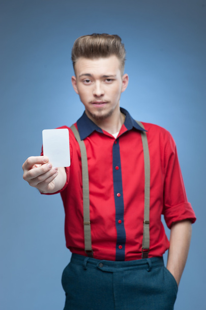 young retro man holding empty card - Foto, imagen