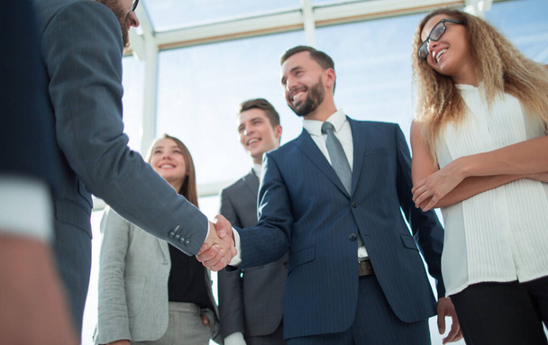 business partners greeting each other with a handshake - Photo, image