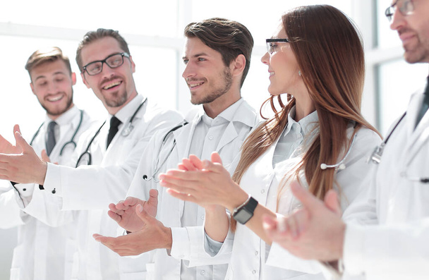 group of successful doctors applauds - Valokuva, kuva