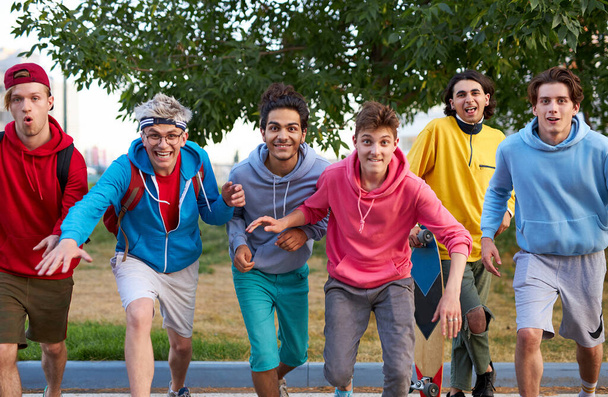 portrait of cheerful teenager boys outdoors - Zdjęcie, obraz