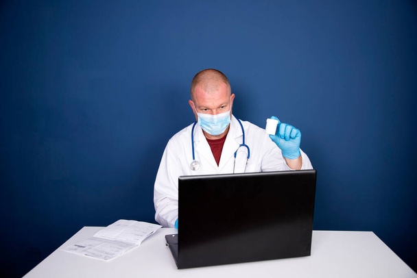 Male doctor consulting patient by online video call on laptop. Remote online medical chat consultation, tele medicine distance services, virtual physician conference call, telemedicine concept.  - Photo, image