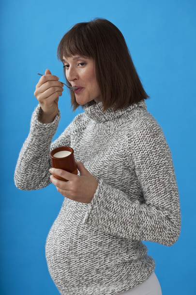 PREGNANT WOMAN EATING - Photo, Image