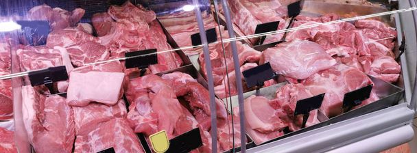 Selection of quality meat at a butcher shop - Fotoğraf, Görsel
