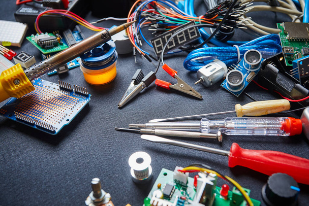 electronic board and tools repairs on black background - Photo, Image
