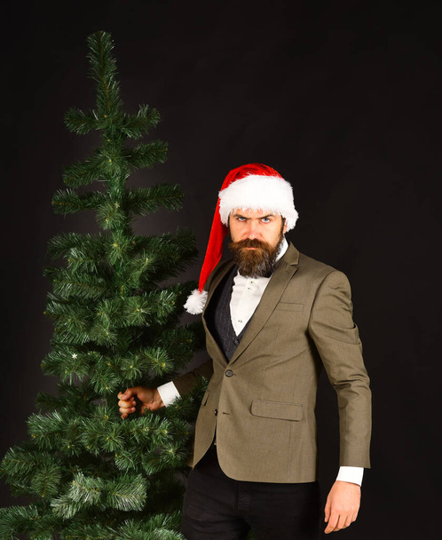 Business and winter vacation concept. Manager with beard - Foto, afbeelding