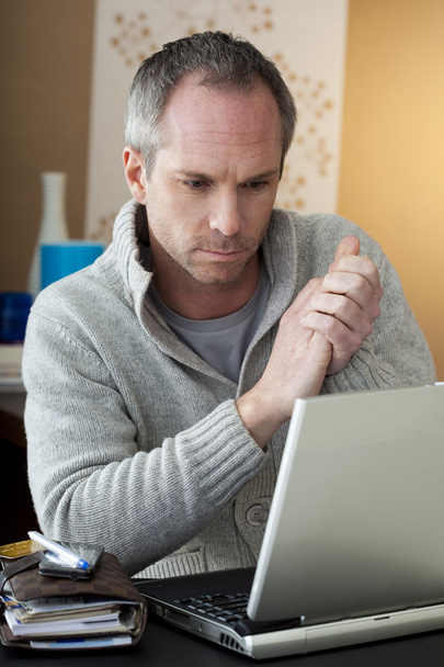 MAN USING A COMPUTER - Photo, Image