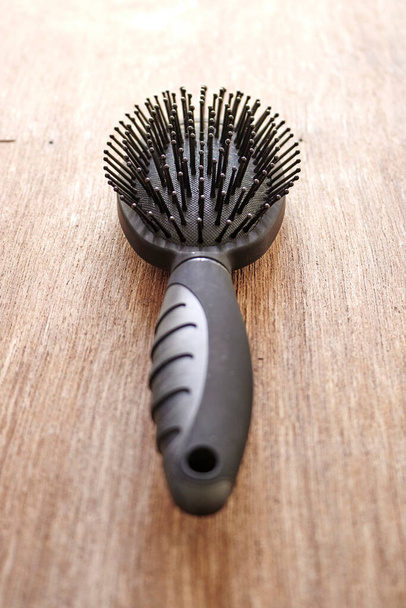 A studio photo of a hair brush - Photo, Image