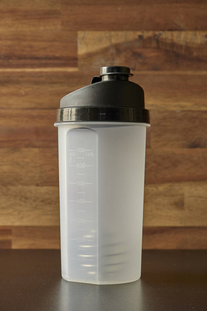 A studio photo of a protein shake at work - Foto, imagen