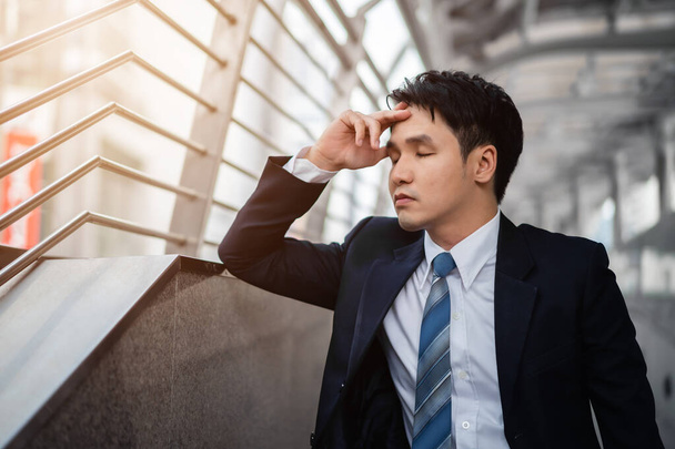 stressed business man in suit in the city - Foto, Imagen