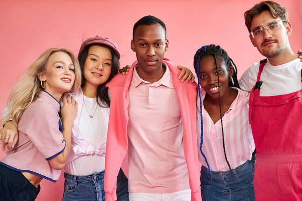 portrait of excited youth of different nationalities isolated on pink - Фото, зображення