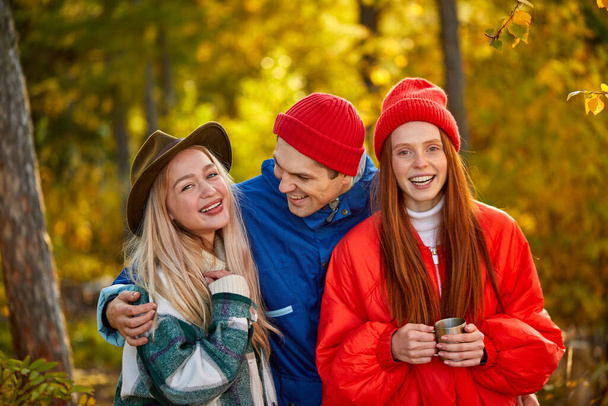 active young people have fun on fresh air in the forest - Фото, зображення