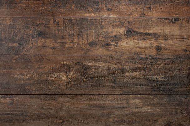 Wooden background. Texture with an old, rustic, brown planks. Old Vintage dark brown wooden table textured background - Φωτογραφία, εικόνα