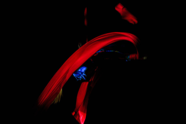 dancer in motion with red ribbon - Photo, Image