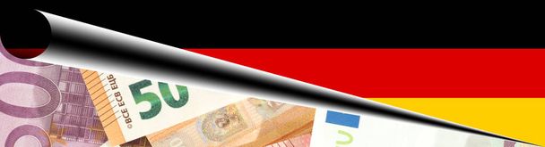 ドイツとユーロ紙幣の旗 - 写真・画像