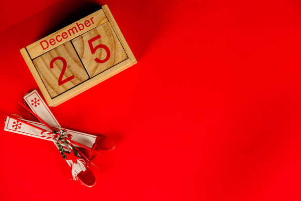 Christmas holidays composition on red background with copy space for your text - Photo, Image