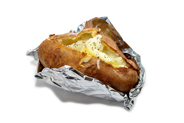 Pommes de terre cuites au four dans une feuille isolée sur du blanc
 - Photo, image