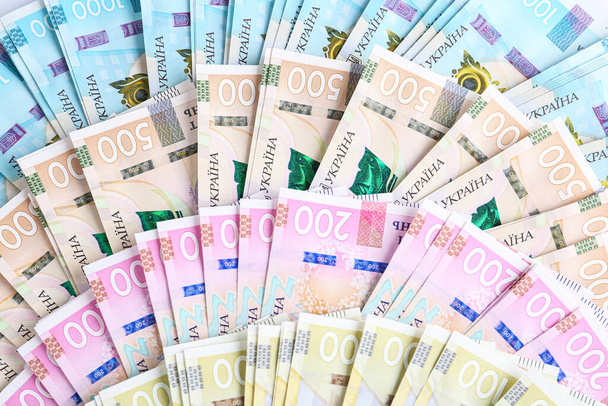 Ukrainian money as background, top view. National currency - Foto, Bild