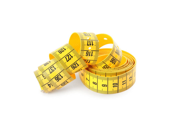 New yellow measuring tape isolated on white - Fotografie, Obrázek