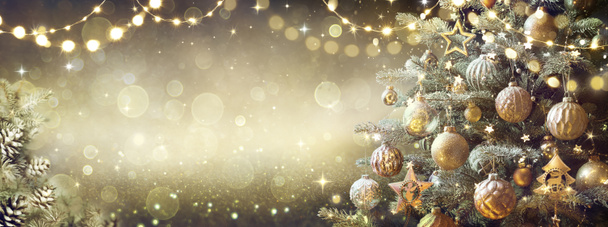Vintage Christmas Tree With Retro Ornament And Golden Shiny Glitter In The Defocused Background - Photo, Image
