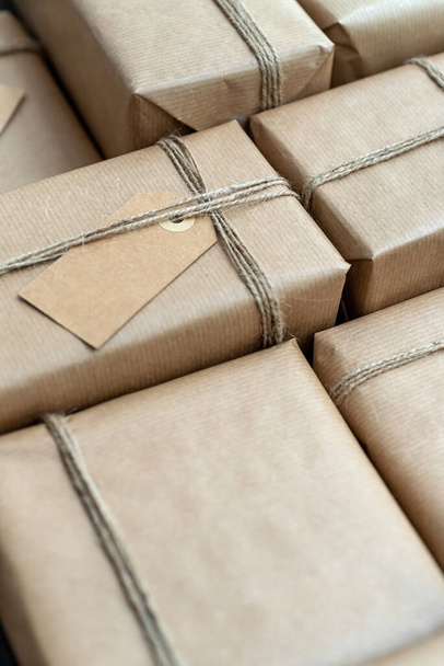 A lot of gifts wrapped in recycled paper - Photo, Image