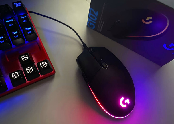 RGB illumination of a computer gaming mouse. Beautiful backlight to create a beautiful computer desktop - Foto, immagini