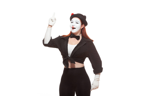 Portrait of a female mime artist performing, isolated on white background. Symbol of an idea, insight, Eureka - Photo, image