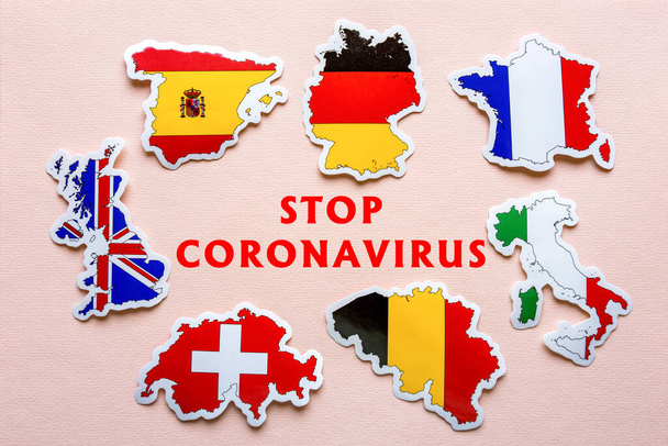 Stop coronavirus in Europe. Maps of Great Britain, France, Germany, Italy, Spain, Belgium, Switzerland with flags on light background. Text STOP CORONAVIRUS. Covid-19 outbreak, pandemic concept. - Foto, immagini