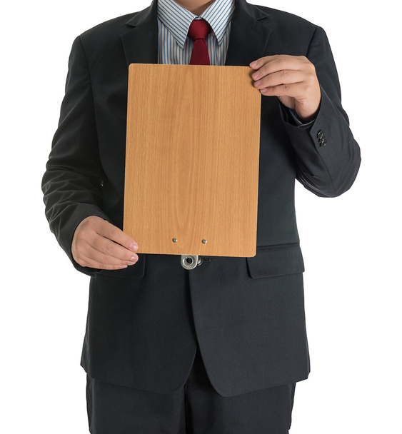 mani uomo d'affari che mostrano bordo vuoto in legno
 - Foto, immagini