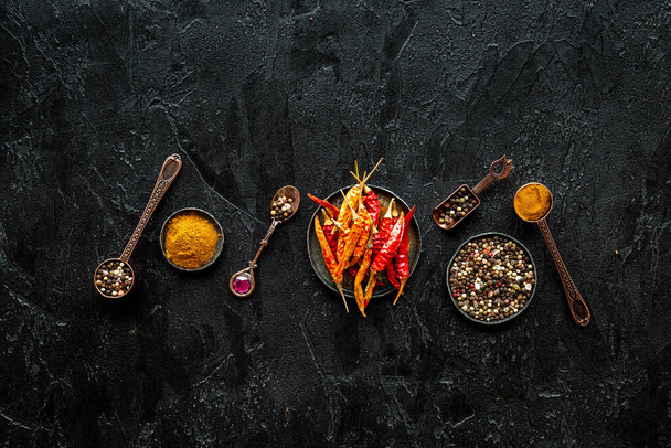 Flat lay of Indian hot spices and herbs, top view - Foto, imagen