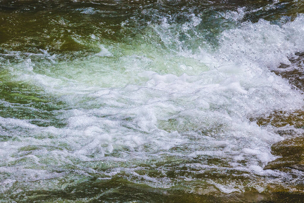 Waves in the mountain river. Fast flow of water - Photo, Image