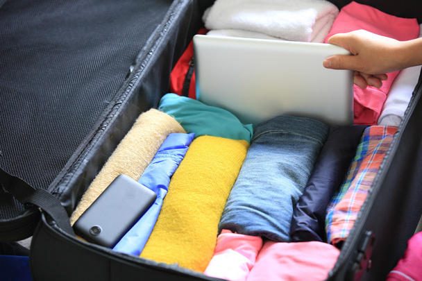 Packing for a new journey - Photo, Image