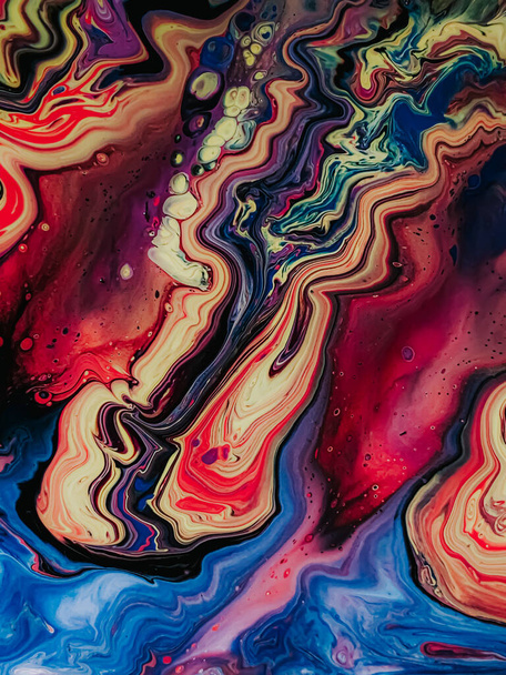A vertical shot of an abstract artwork with colorful curves and shapes - Фото, зображення