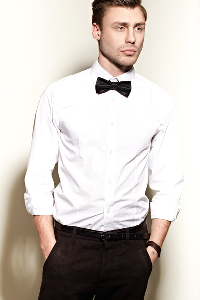 Man in white shirt and bow tie - Zdjęcie, obraz
