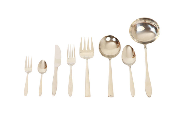 A set of various silver flatware isolated on a white background - Foto, Imagem