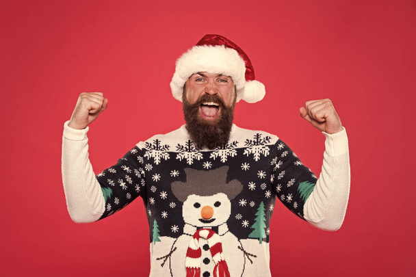 Celebration time. Emotional man Santa hat celebrate new year. Traditional celebration. Feeling awesome successful cheerful. Christmas celebration. Emotional expression. Having fun. Happiness and joy - Photo, Image