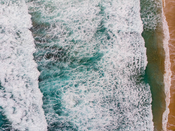 A top view of a wavy sea - 写真・画像