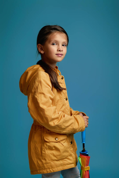 cute child girl with multicolored umbrella - Zdjęcie, obraz