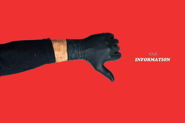 Man's hand with thumb down on in black rubber gloves, symbol, sign or gesture. Cropped view of man's hands in black latex gloves good  isolated on red. Doctor'S Hand In Medical Gloves. Studio shot. High quality photo. - Photo, Image