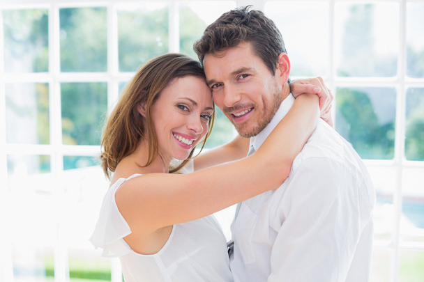 Side view portrait of loving couple at home - Photo, image