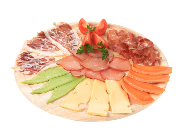 Various cheese on wooden platter - Foto, imagen