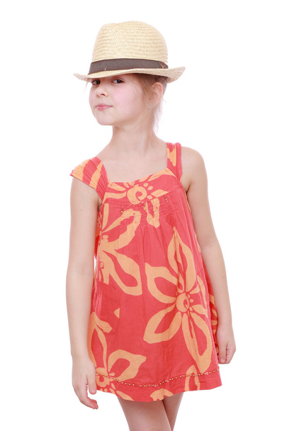 Girl in summer dress and straw hat - Fotoğraf, Görsel