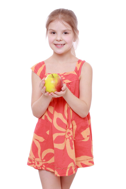 Girl with apple - Foto, imagen