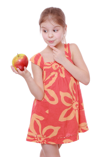Girl with apple - Фото, изображение