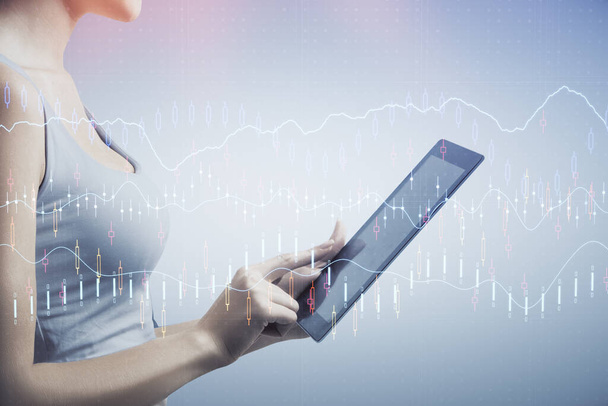 Double exposure of forex chart sketch hologram and woman holding and using a mobile device. Financial market concept. - Foto, Imagen