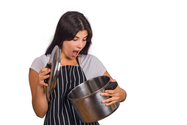 Woman chef holding a big cooking pot - Photo, image