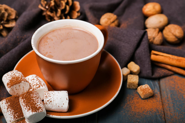 Cup of hot cacao drink with marshmallows on table - Foto, Bild
