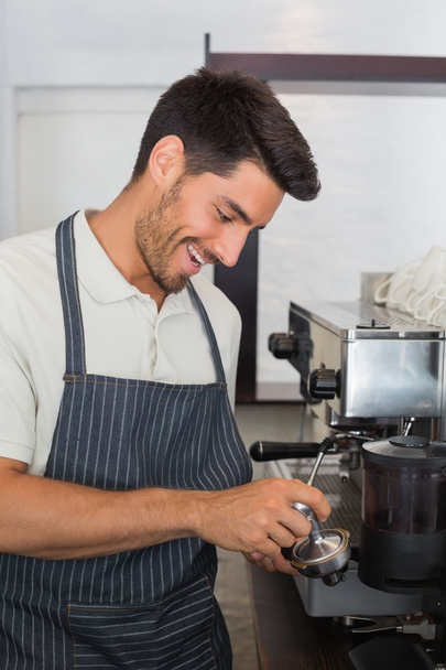 Waiter preparing espresso at coffee shop - Fotoğraf, Görsel