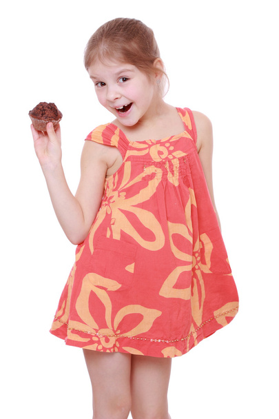 Girl holding cupcake - Photo, image