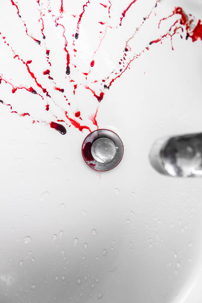 blood water drain isolated on white background. - Φωτογραφία, εικόνα